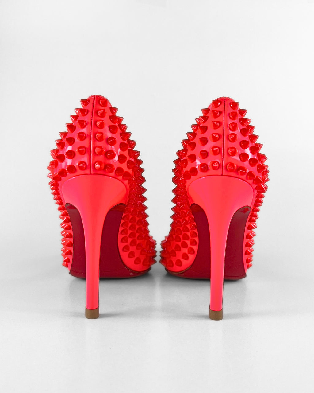 Christian Louboutin Pigalle Spikes Patent Fluorescent Rose Pumps (EU 37.5)